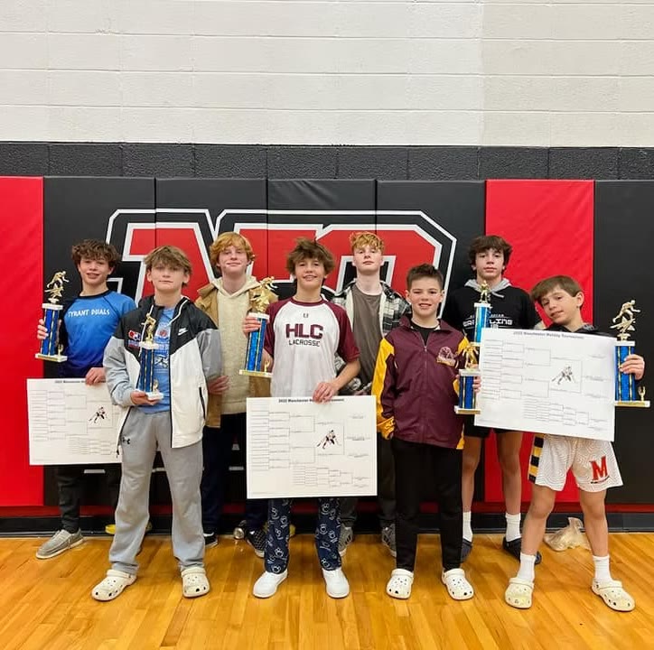The Zone tournament team with trophies at MAWA